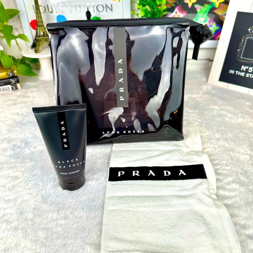 Prada clear tinted cosmetic bag with face cleanse and Prada towel set Lu…